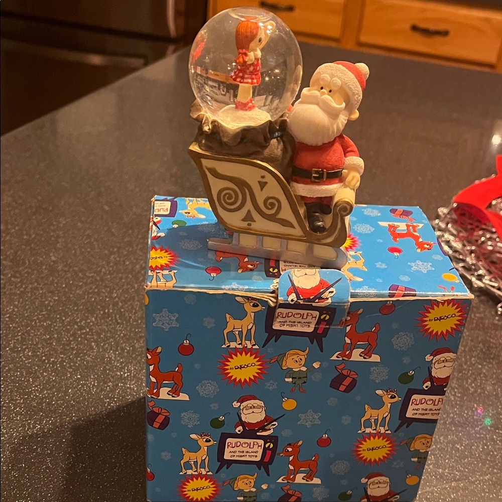 Santa and Misfit toy Snow Globe with Sleigh - Festive Holiday Decor